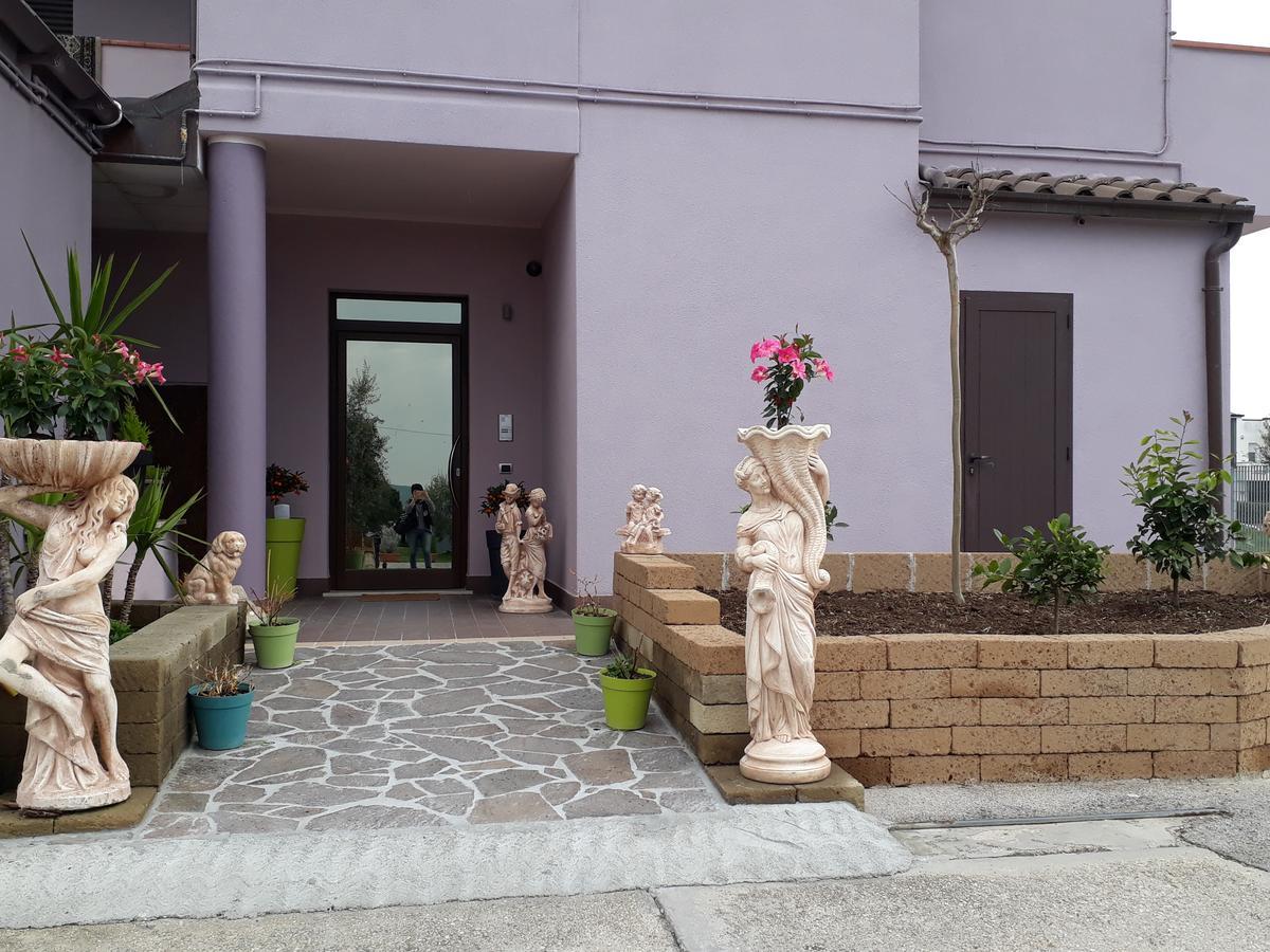 Pensione Degli Ulivi ปอร์โต ซันเตลปีดิโอ ภายนอก รูปภาพ